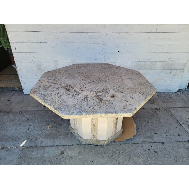 Vintage solid granite stone octagonal shape dinning table with octagonal shape pedestal base. It was designed and...