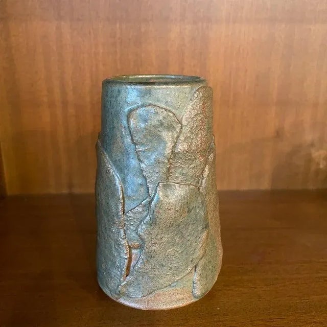 Signed mid-century modern, hand-made, abstract art pottery vase features a rustic, high glaze, layered surface in green...