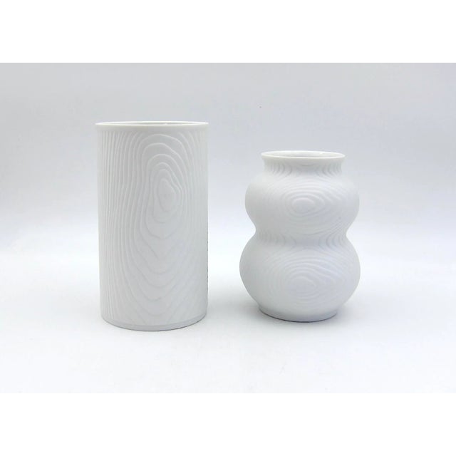 A set of two vintage Op Art vases in white bisque porcelain manufactured by Hutschenreuther Tirschenreuth of Germany and...