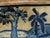A 20th century Chinese Peking rug with 2 reindeers and a large bird in a scenic background with a tree and palm tree. The...