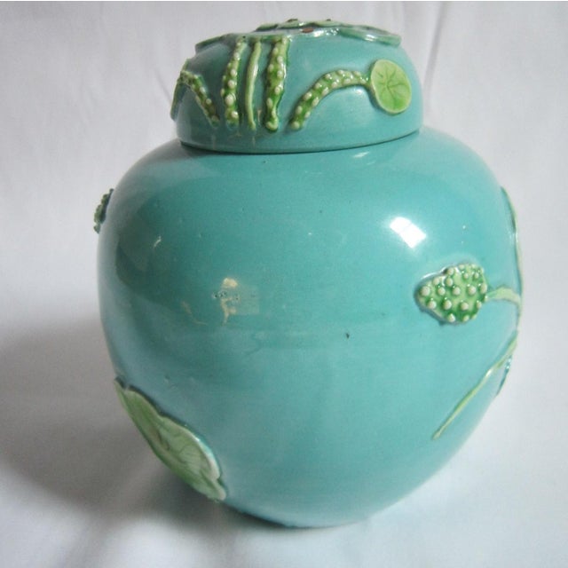 Antique Chinese Wang Bing Rong Giner Jar. Crane Motif in relief. It measures :H x :D and is in excellent condition. It...