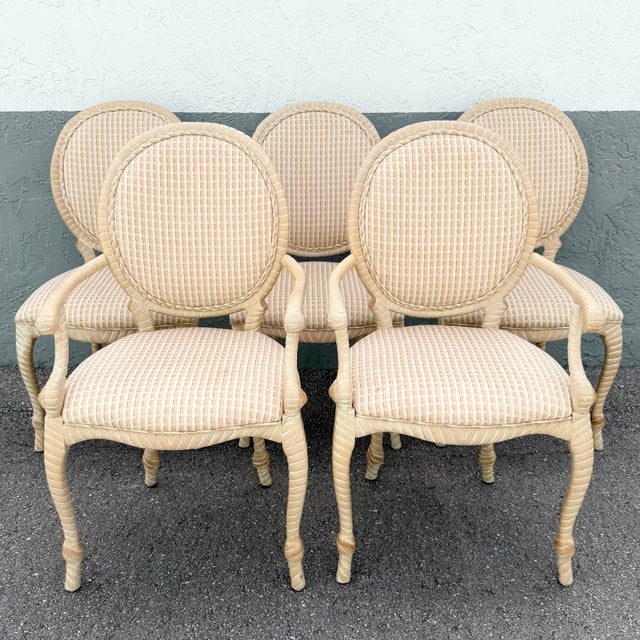 This elegant set of five French Provincial dining chairs showcases timeless craftsmanship and romantic Old World charm....