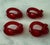 Set of 4 mid century red lucite acrylic napkin rings in the shape of a pretzel or knot in the style of Dorothy Thorpe.