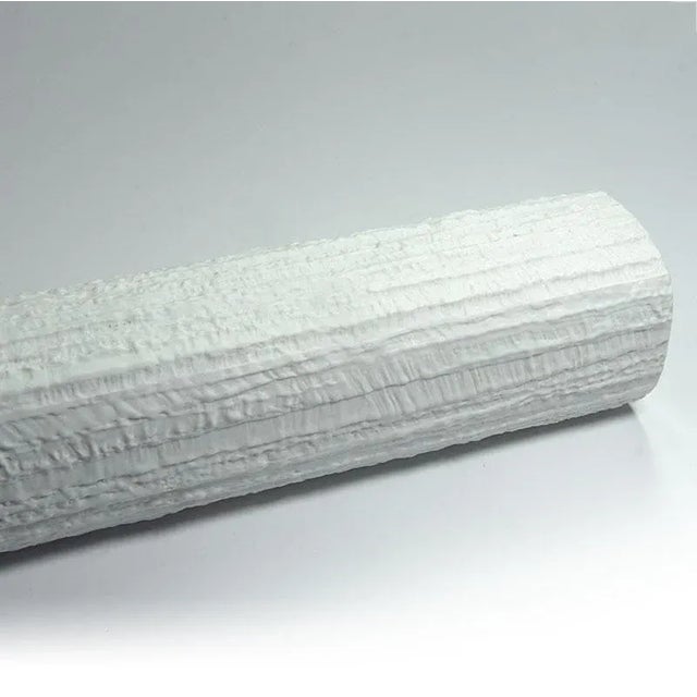 A very tall Arcta vase made of bisque porcelain with a striking brutalist texture. It was designed by Richard Scharrer....