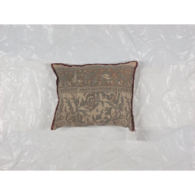 Pillow with vintage hand made Chain stitch rug fragment. Poly filled, with sewn closure both sides.