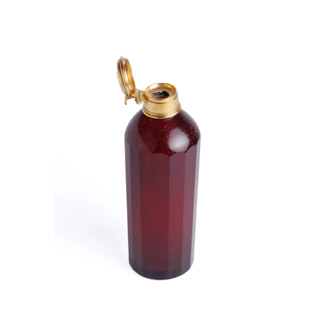 Georgian Dutch Style Scent Bottle, Gold Hinging Cap, Ruby Glass, Circa 1820. Made of faceted ruby glass and yellow gold...