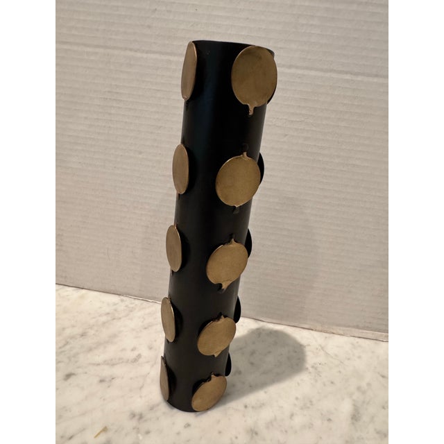 Hand made black and gold round metal vase by Arteriors Home. Vessel can be left empty and displayed as a sculptural...