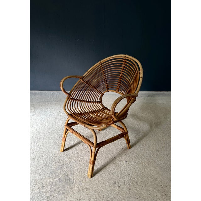 Midcentury Italian Design Bamboo Pod Arm Chair. Made in Italy, 1960's period. Solid bend bamboo constructed armchair, with...