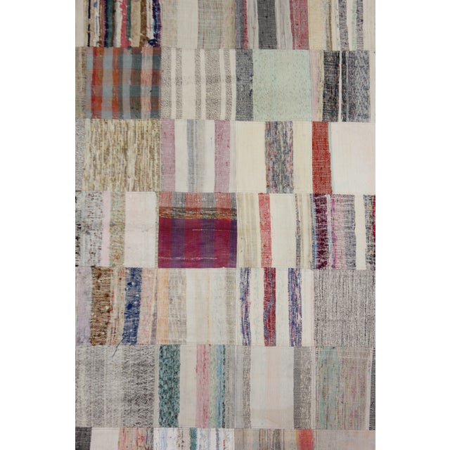 A beautiful antique Patchwork Rug . It's in very good condition, practically new. This Patchworks rug is produced of older...