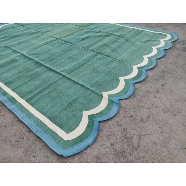 Handmade Cotton Vegetable Dyed Scalloped Edge Rug in Forest Green With Cream and Teal Blue Border - 8x10 For Sale - Image 6 of 11