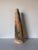 Striking 1980s studio pottery vase by Tony Evans, featuring a tall, slender tapered form with an organic Raku-style glazed...