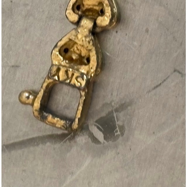 1980s SKY gold-tone/rhinestone heart tennis bracelet. Excellent condition.