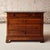 Elevate your space with this 19th century French walnut chest of drawers with marble top, a timeless antique that combines...
