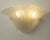 Elegant fan-shaped wall light in silk-colored murano glass, made in italy wall lamp dimensions: w 40cm x h 22cm x d 15cm...