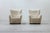 Pair of lounge chairs in the manner of Märta Blomstedt. Designed and produced in Denmark by Danish cabinetmaker. Legs in...