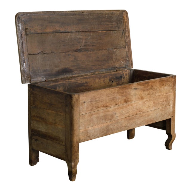 A simple and chic vintage wood trunk from France. The perfect additional storage and style in any space.