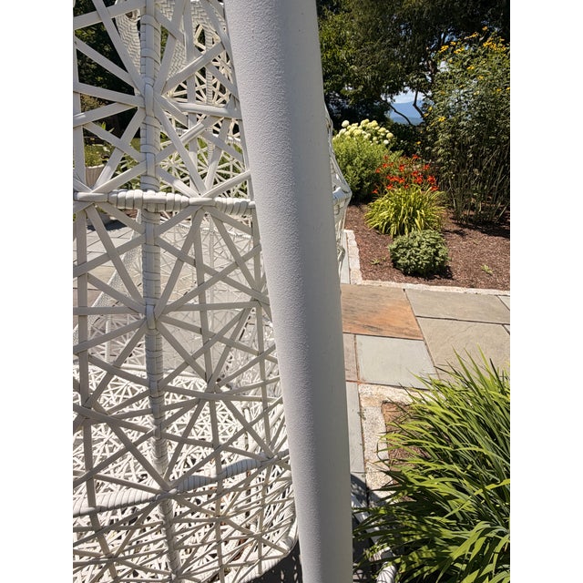 Kettal "Maia" Egg Swing by Patricia Urquiola — White with Cushion, Red Rope Detail. The item is unmarked. A sculptural egg...