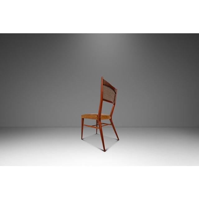 Introducing a one-of-a-kind, luxury piece of authentic twentieth century furniture - a rare model 7001 side chair designed...