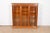 A beautiful antique Victorian or Renaissance Revival lighted triple bookcase or display cabinet In the manner of R. J....
