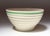 Vintage beehive form yellow ware mixing or salad bowl with attractive green stripe motif (ca. 1940s, USA). Crazing present...