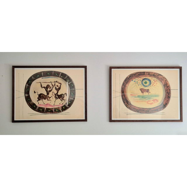 An exquisite collection of twp framed shiny polychrome prints of Picasso Vallauris ceramic plates depicting Centaurs and...