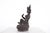 Green copper alloy sculpture depicting a Nepalese female deity, dating from the 19th century. H 32 cm x W 22 cm x D 15 cm....
