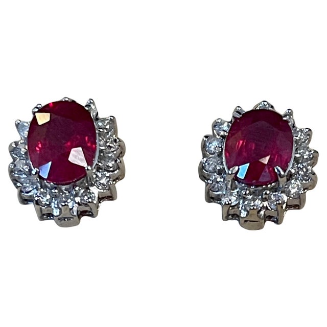 These stunning stud earrings feature a 4 carat oval treated ruby and 1.2 carats of brilliant-cut diamonds. They are...