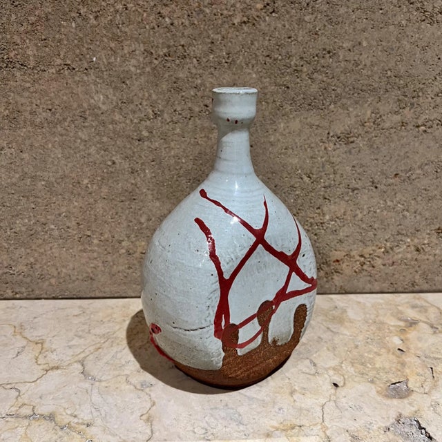 For your consideration, a vintage 1970s studio pottery bottle vase, likely of Japanese or California studio origin. It...