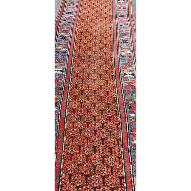 Tribal Antique Persian Kurdish Long Gallery Runner With Repeating Tribal Motif Design 3'5 X 14'9 For Sale - Image 3 of 9