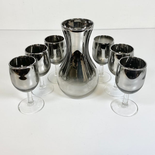 Dorothy Thorpe was an iconic Mid-Century American designer. She is most known for producing glassware with Silver bands...