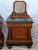 An elegant matched pair of Italian nightstands dating to the 1930s, blending Art Deco sophistication with Neoclassical...