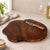 Dimensions: 17" W x 1" D x 17" H This natural serving board makes the most of the wood's irregular growth ring patterns...