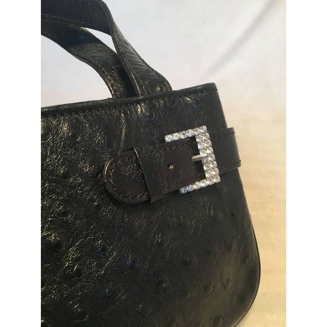 Mcm ostrich bag clearance