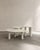 Set of 3 sunpoet coffee tables in carved honed bianco onyx by paloma editions dimensions: large: d 77 x w 111 x h 35 cm....