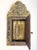 This wall cabinet with beveled mirror and accompanying brush is executed in the victorian style. the richly ornamented...