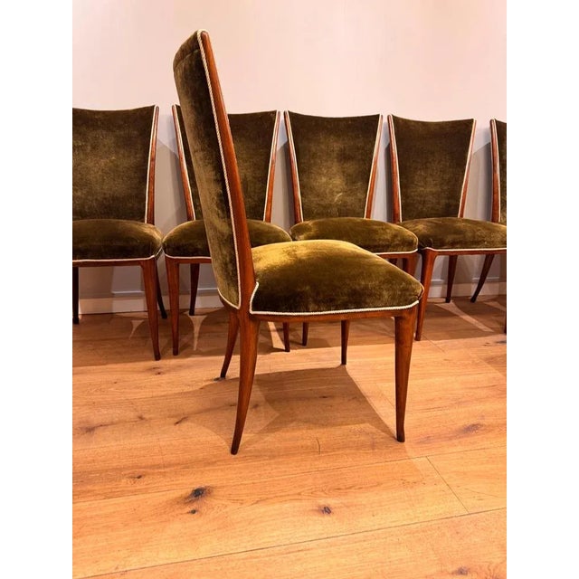 A very rare set of 8 dining room chairs designed and produced by Osvaldo Borsani C1940s . Solid cherrywood frames later...
