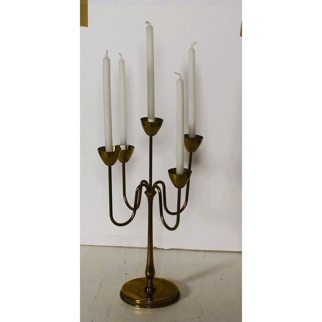 Brass Candelabra by Gunnar Ander for Ystad Metall, 1970, in Very Good conditions. Designed 1970 to 1979 This piece has an...
