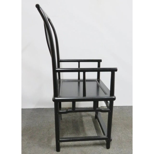 Ebonized frame pierced back with bowed center piece. Perfect for a modern Asian room.