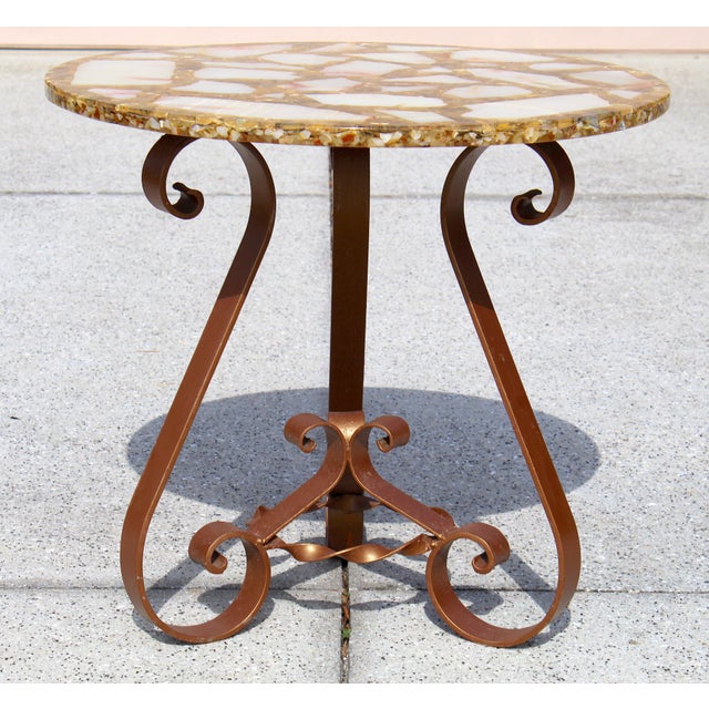 Make a statement with this stunning vintage side table featuring a genuine agate, onyx, and colorful abalone shell mosaic...