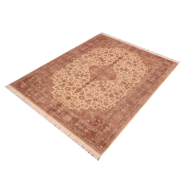 Designed with mesmerizing intricacy and gorgeous color palette, this hand-knotted masterpiece demonstrates the beauty and...