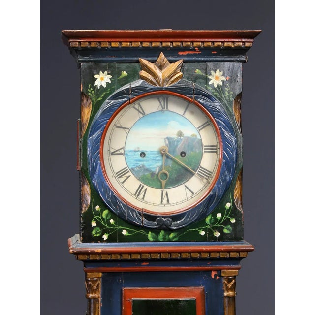 - This green painted clock of 1840 is elaborately painted and decorated - The dial with Roman numerals is already a work...