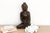 Introduce a profound sense of peace and spiritual artistry to your space with this magnificent hand-carved stone Buddha....