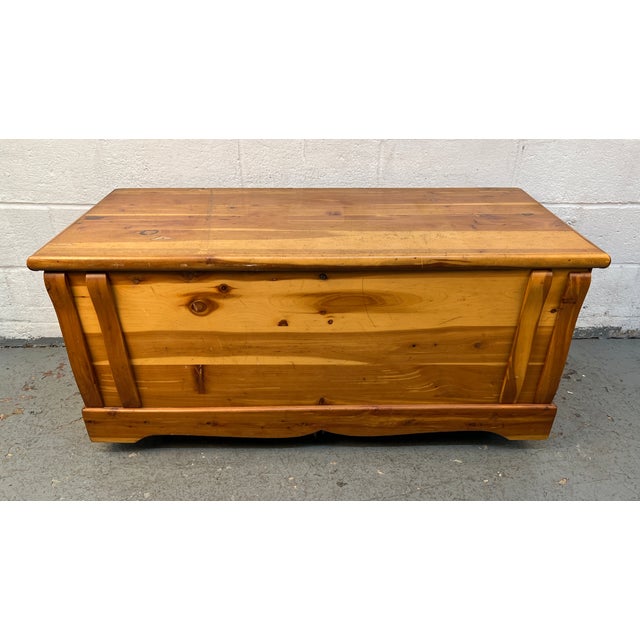 Add timeless style and practical storage to your home with this vintage Murphy-style cedar chest. Crafted with quality...