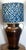 This large copper table lamp with brass handles by iconic lamp designer Frederick Cooper demands attention. The hammered...