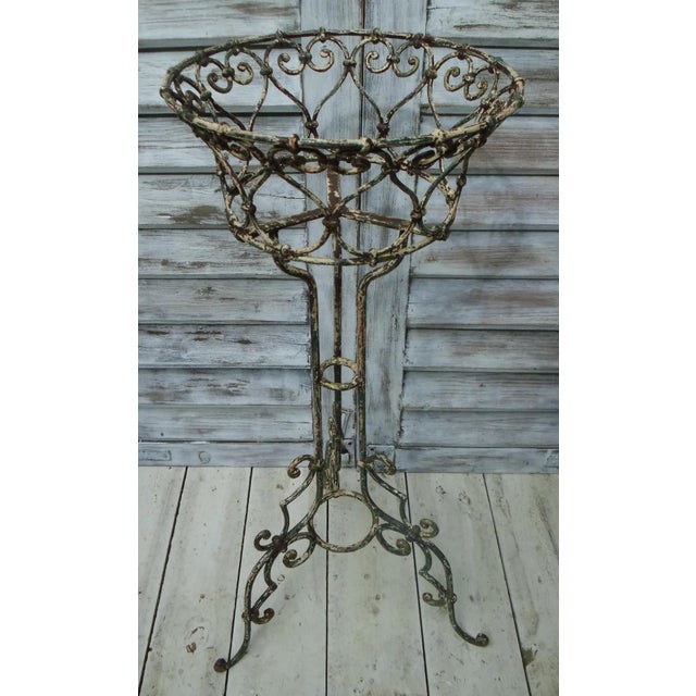 This antique flower stand truly embodies the ultimate shabby chic look, featuring a range of colors from white and gold to...