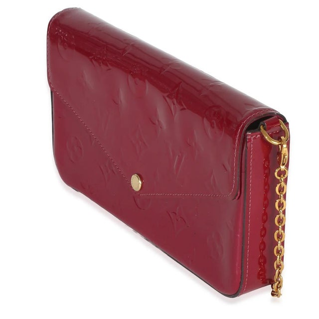 Item #: 153515 Features Interior: Single slot pocket Dimensions: 8.5 x 4.5 x 1.25 in Handbag Closure Type: Snap Strap...