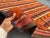 Textile Vintage Distressed Flat Weave Kilim Runner Rug, Earthy Red Orange Geometric Stripes Rug For Sale - Image 7 of 10