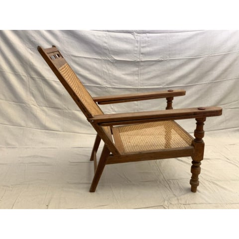 An authentic 19th-century Anglo-Indian colonial planter's lounger sourced from the historic port city of Karachi,...