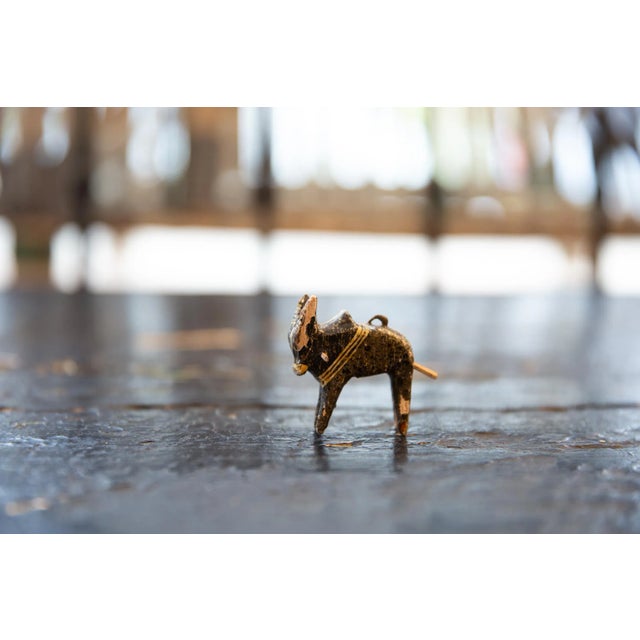 Vintage circa 1950s hand-painted wooden bull ornament or pendant from Spain.