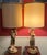 This is a pair of beautiful vintage figural lamps, featuring a young man and a young lady carrying baskets of fruit. The...